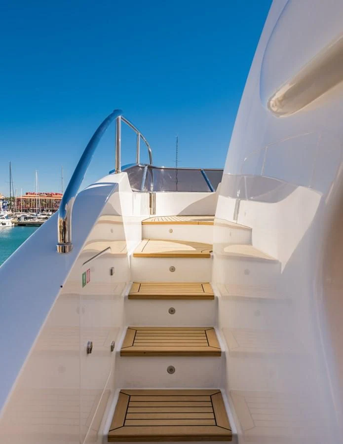 a white boat with a metal frame aboard LA BELLA SARA III Yacht for Sale