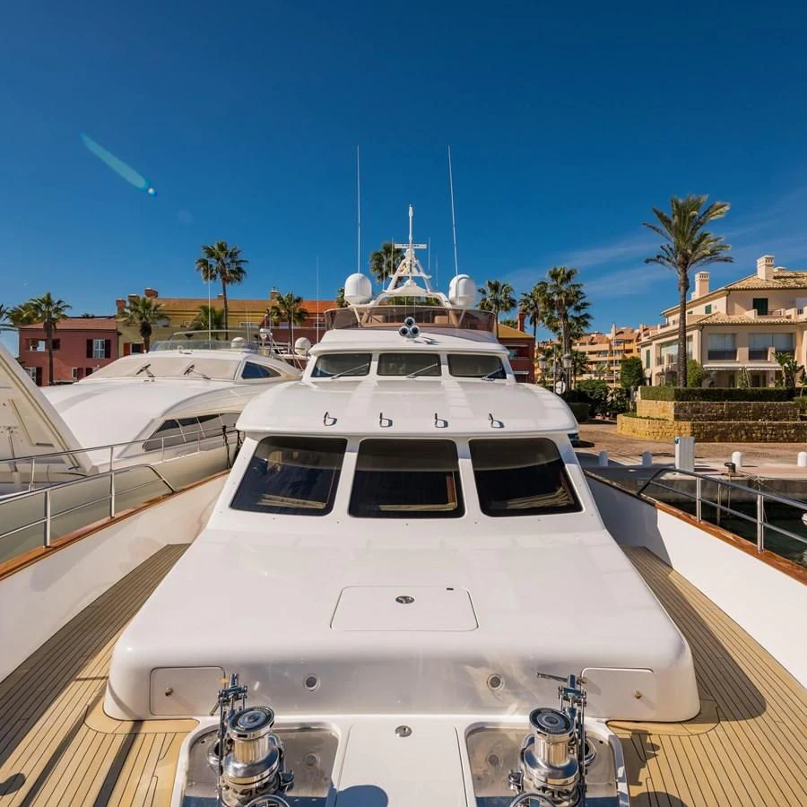 a white car on a road aboard LA BELLA SARA III Yacht for Sale