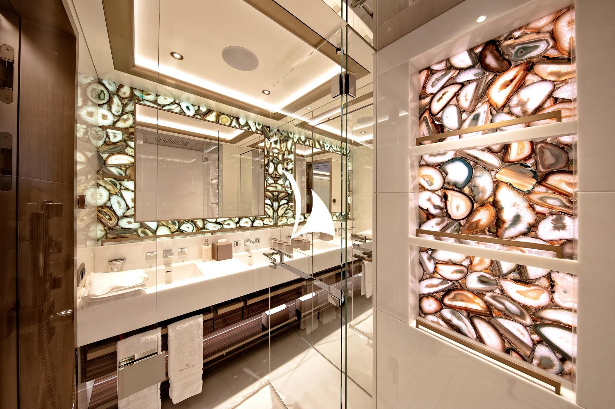 a bathroom with a large mirror aboard ARROW Yacht for Sale