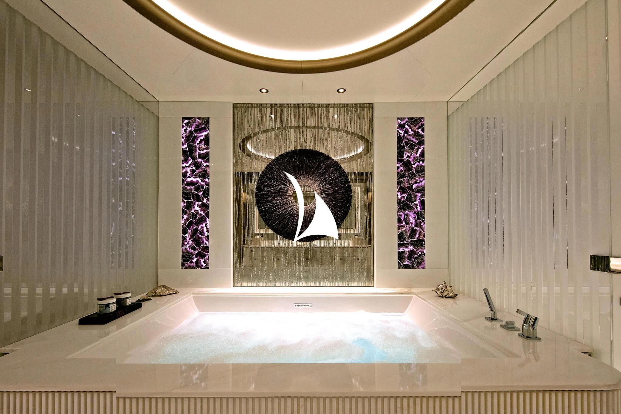a large bathtub with a large mirror above it aboard ARROW Yacht for Sale