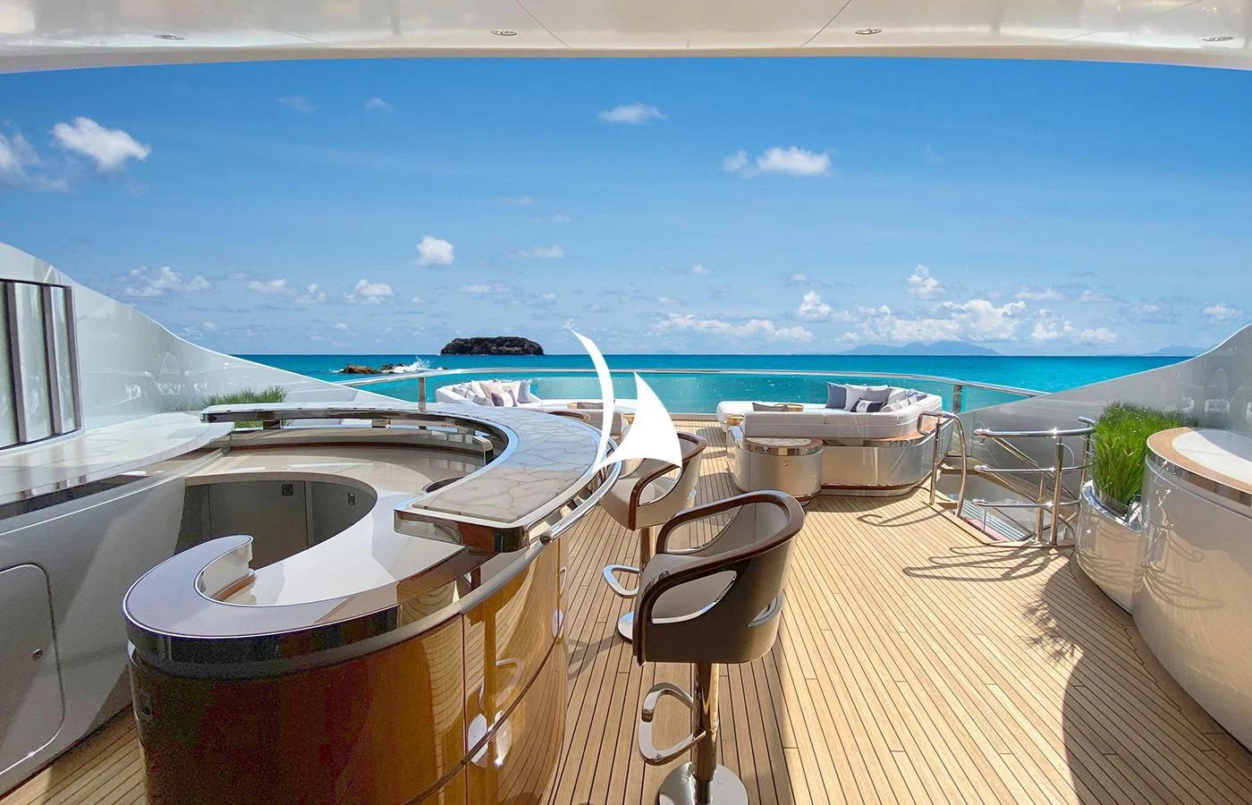 a deck with a view of the ocean and the ocean aboard ARROW Yacht for Sale