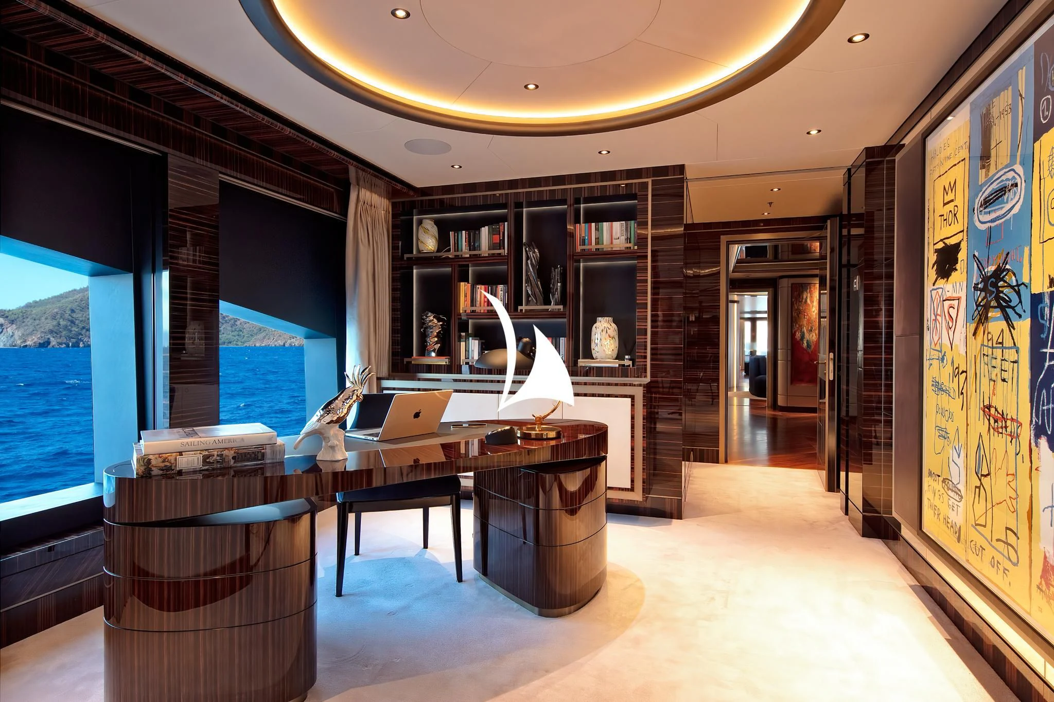 a room with a desk and a large screen aboard ARROW Yacht for Sale