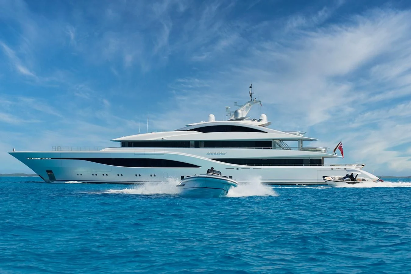 a white yacht on the water aboard ARROW Yacht for Sale