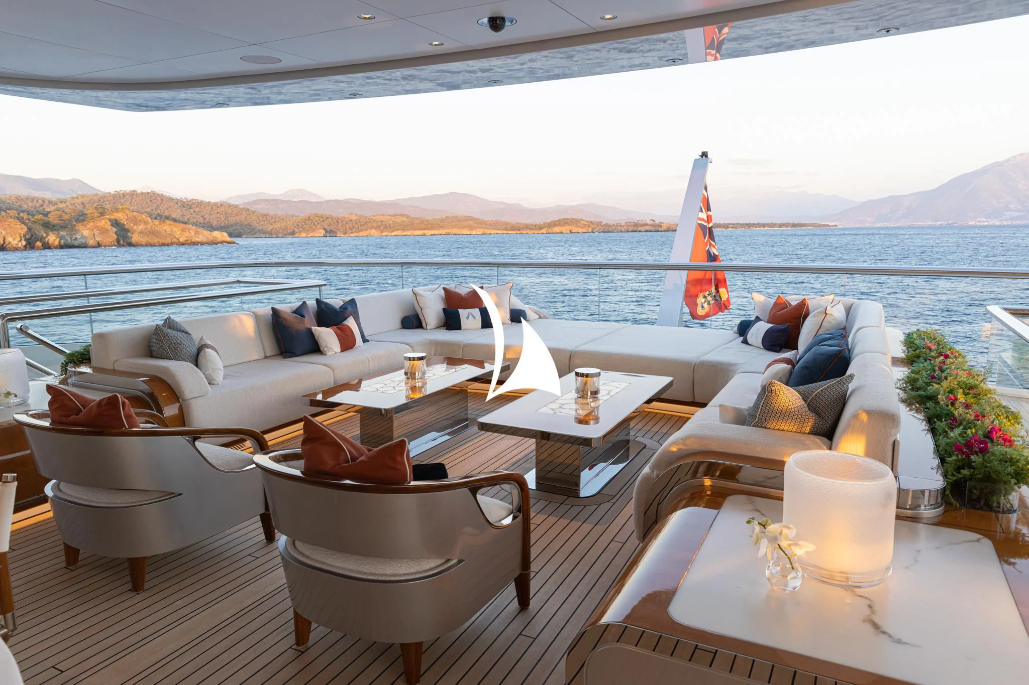 a room with a couch and a table and chairs aboard ARROW Yacht for Sale