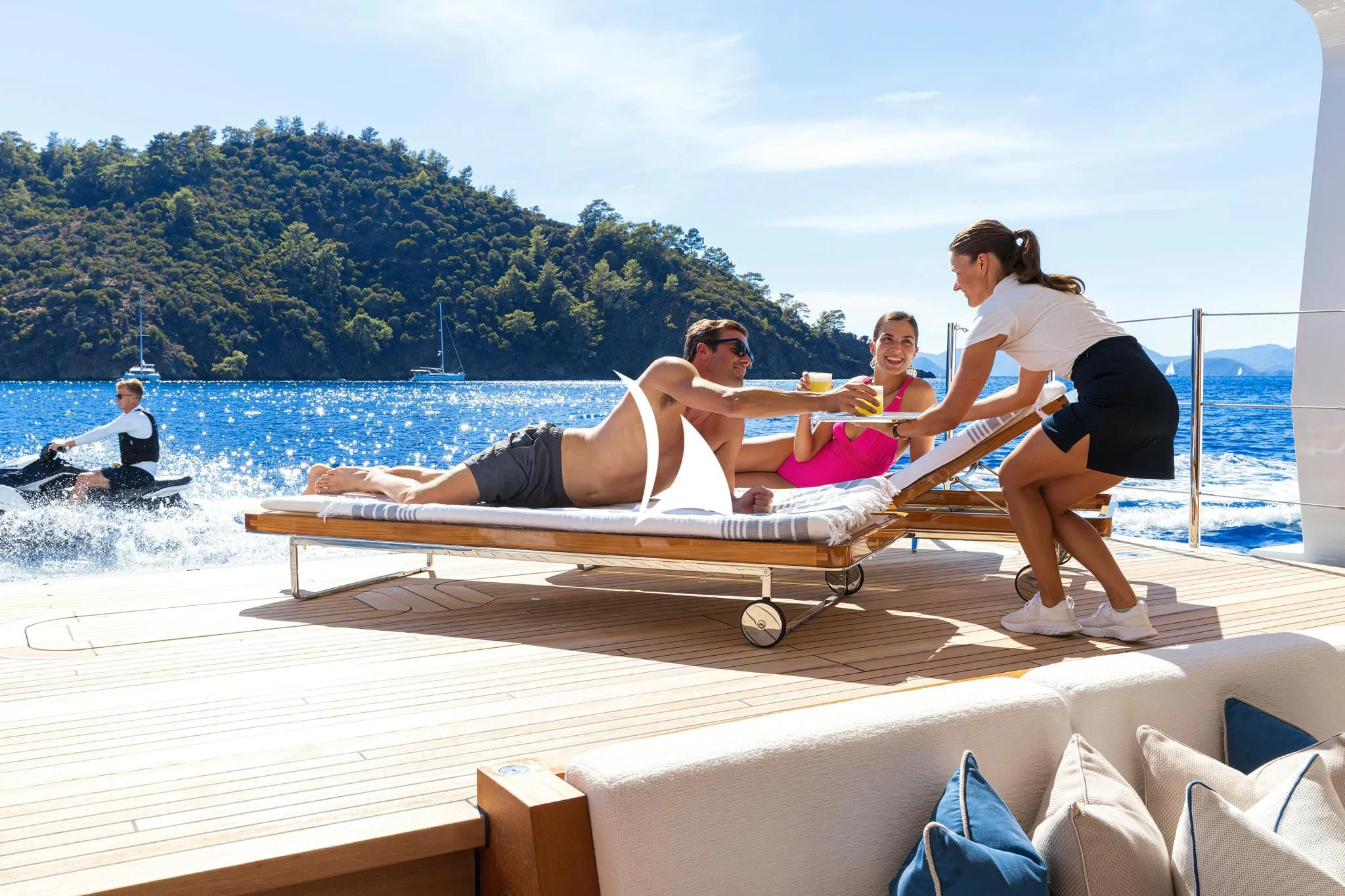 a group of people on a dock aboard ARROW Yacht for Sale