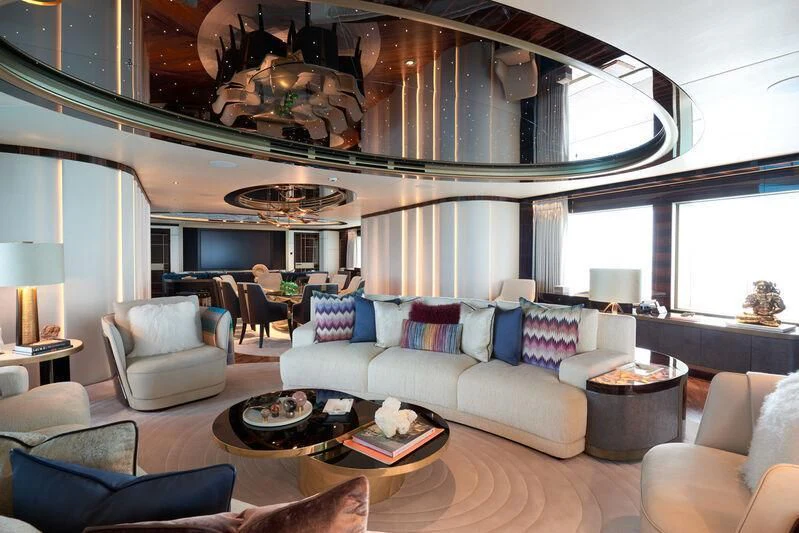 a living room with a large mirror aboard ARROW Yacht for Sale