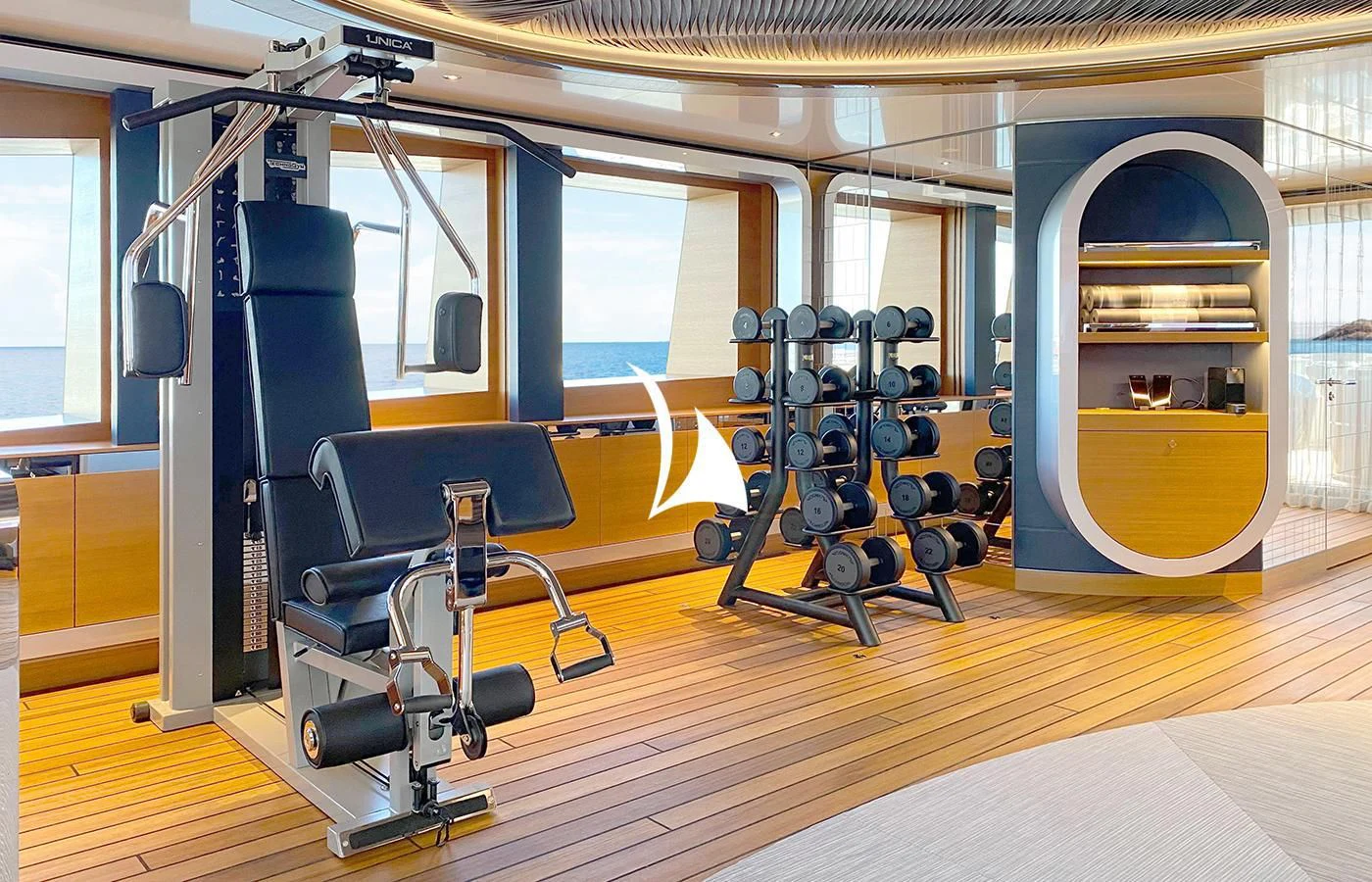 a gym with exercise equipment aboard ARROW Yacht for Sale