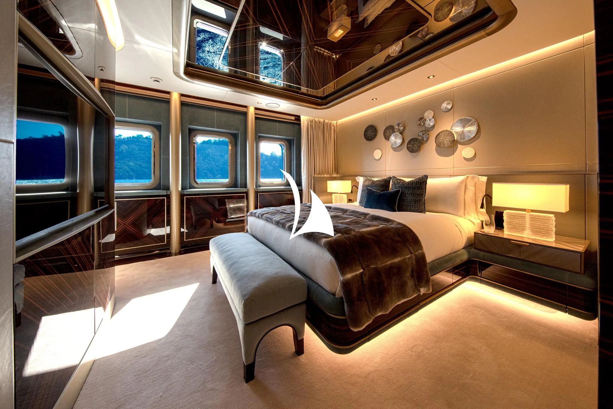 a room with a bed and a couch aboard ARROW Yacht for Sale