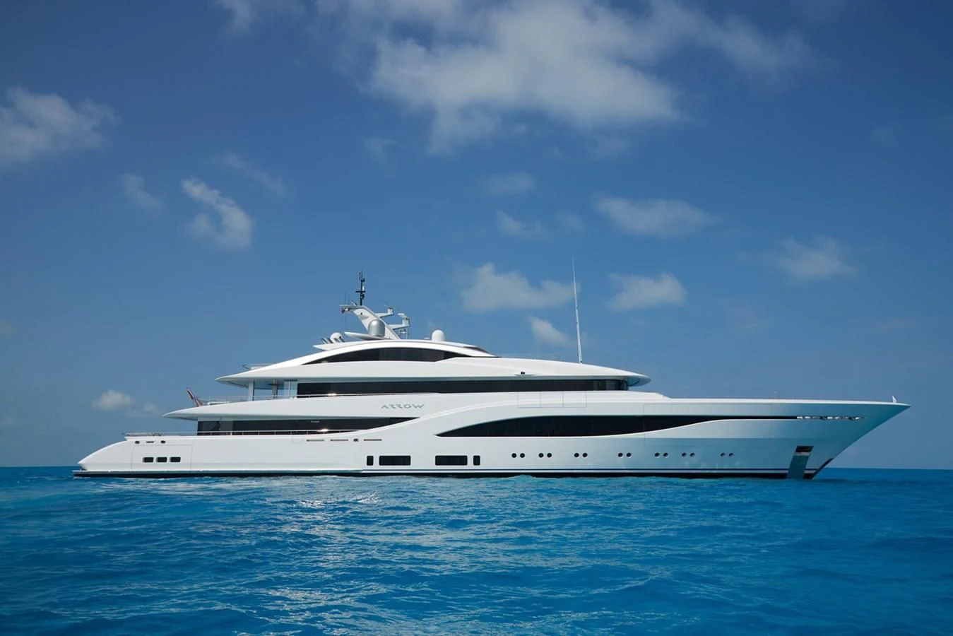 a white yacht in the water aboard ARROW Yacht for Sale