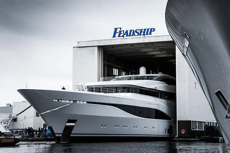 a large cruise ship docked aboard ARROW Yacht for Sale