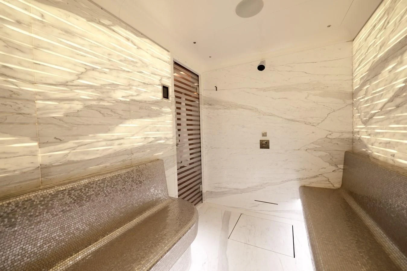 a white room with a staircase aboard ARROW Yacht for Sale