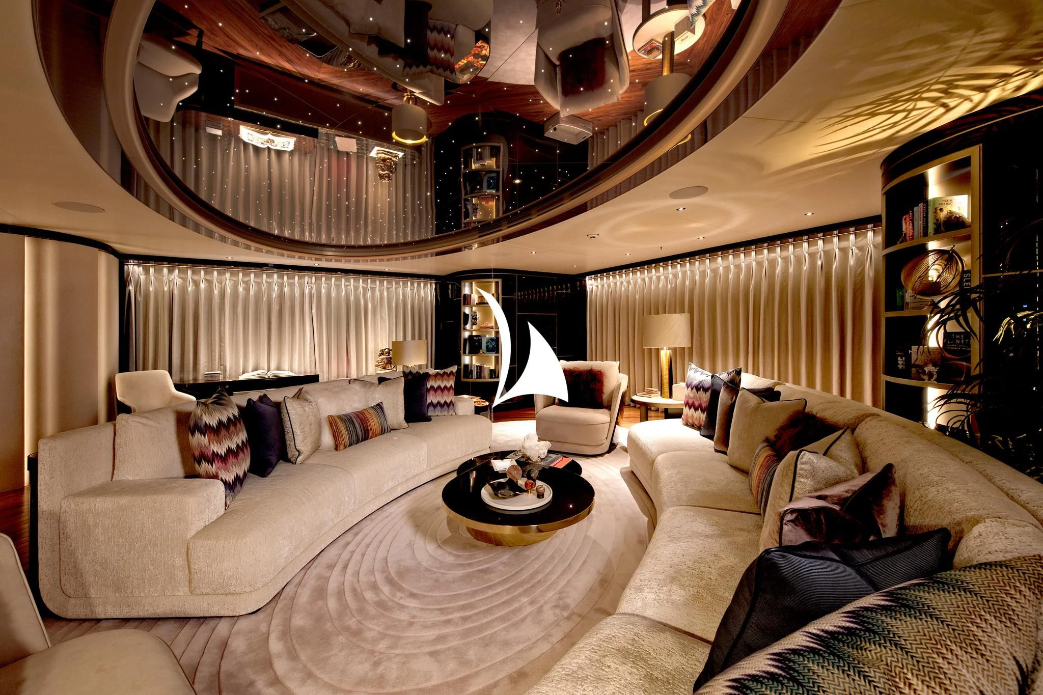 a large room with a large bed and a large mirror aboard ARROW Yacht for Sale