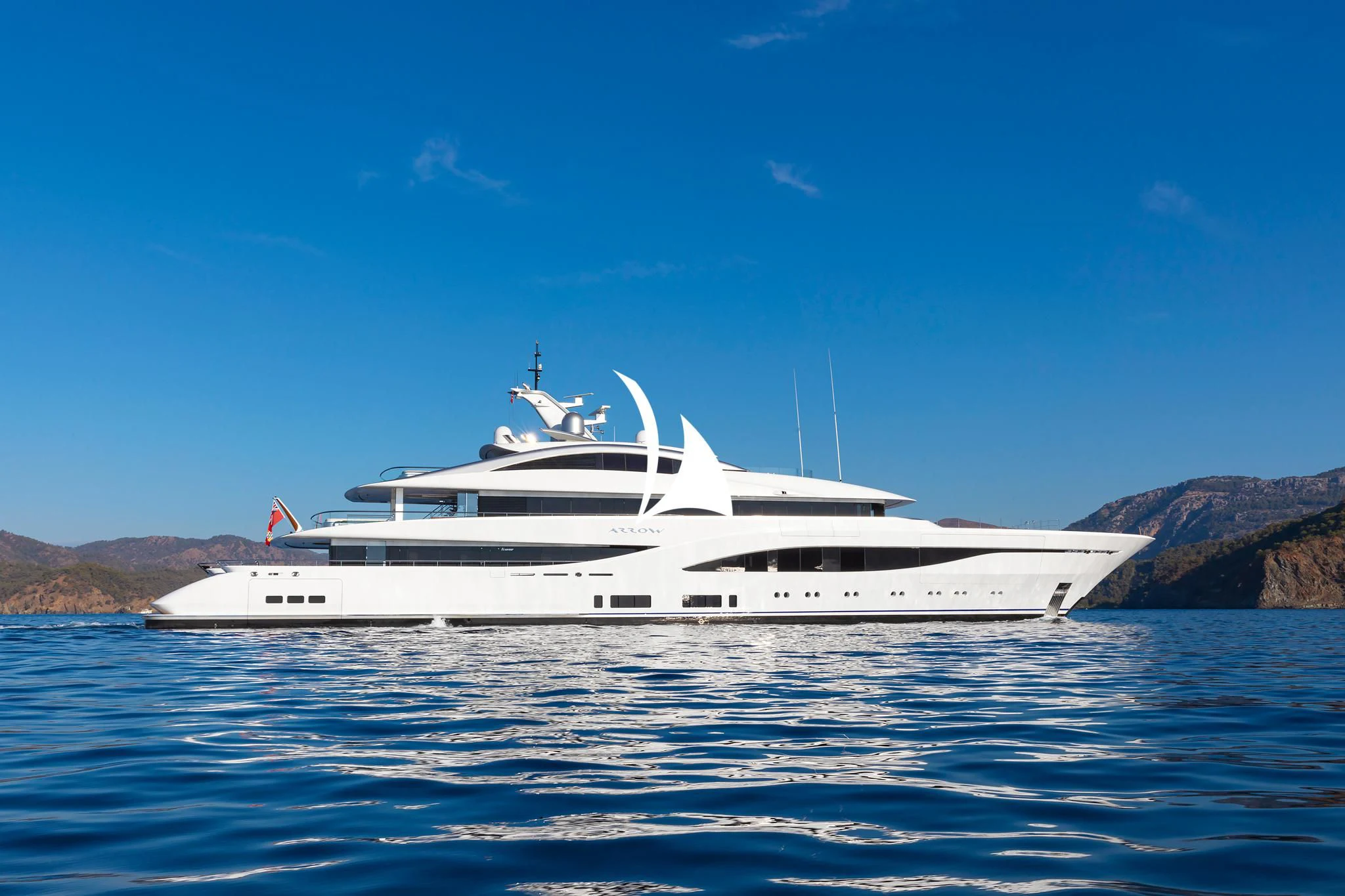 a white yacht in the water aboard ARROW Yacht for Sale