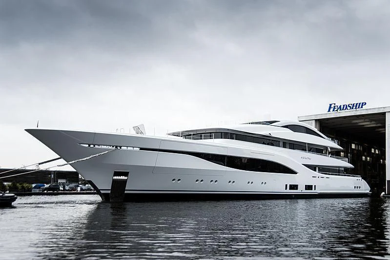 a white yacht in a body of water aboard ARROW Yacht for Sale