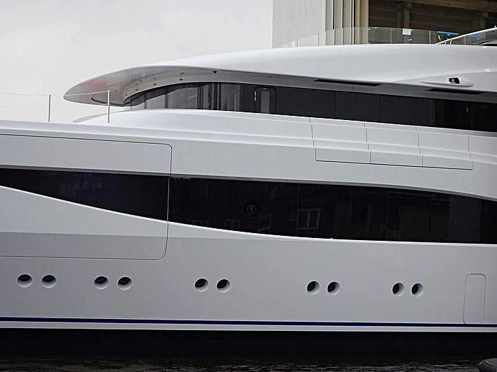 a white yacht with black trim aboard ARROW Yacht for Sale