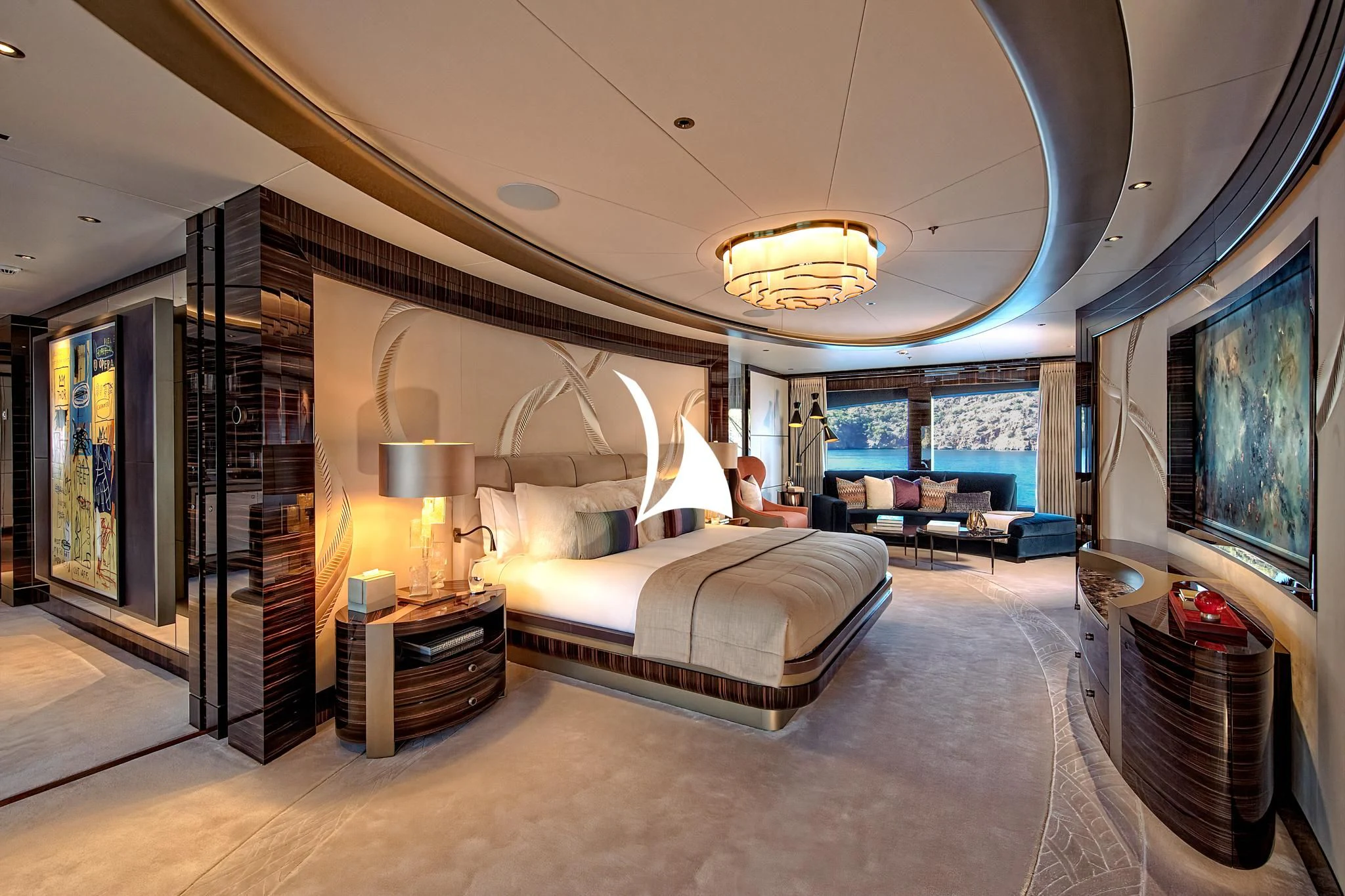 a bedroom with a large mirror aboard ARROW Yacht for Sale