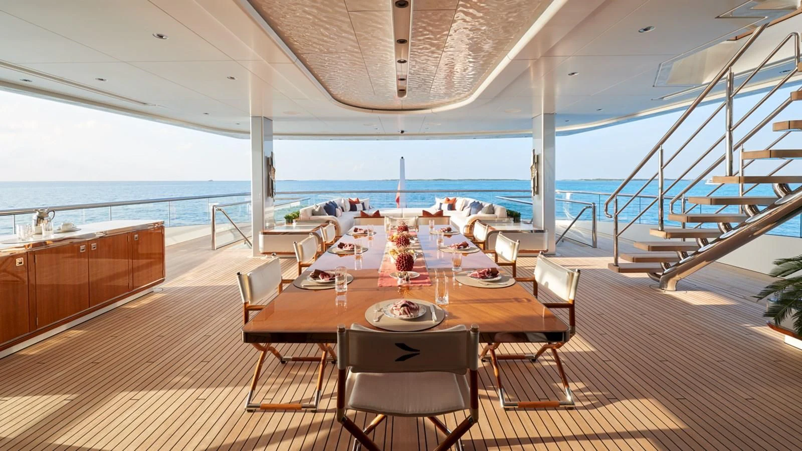 a room with a table and chairs aboard ARROW Yacht for Sale