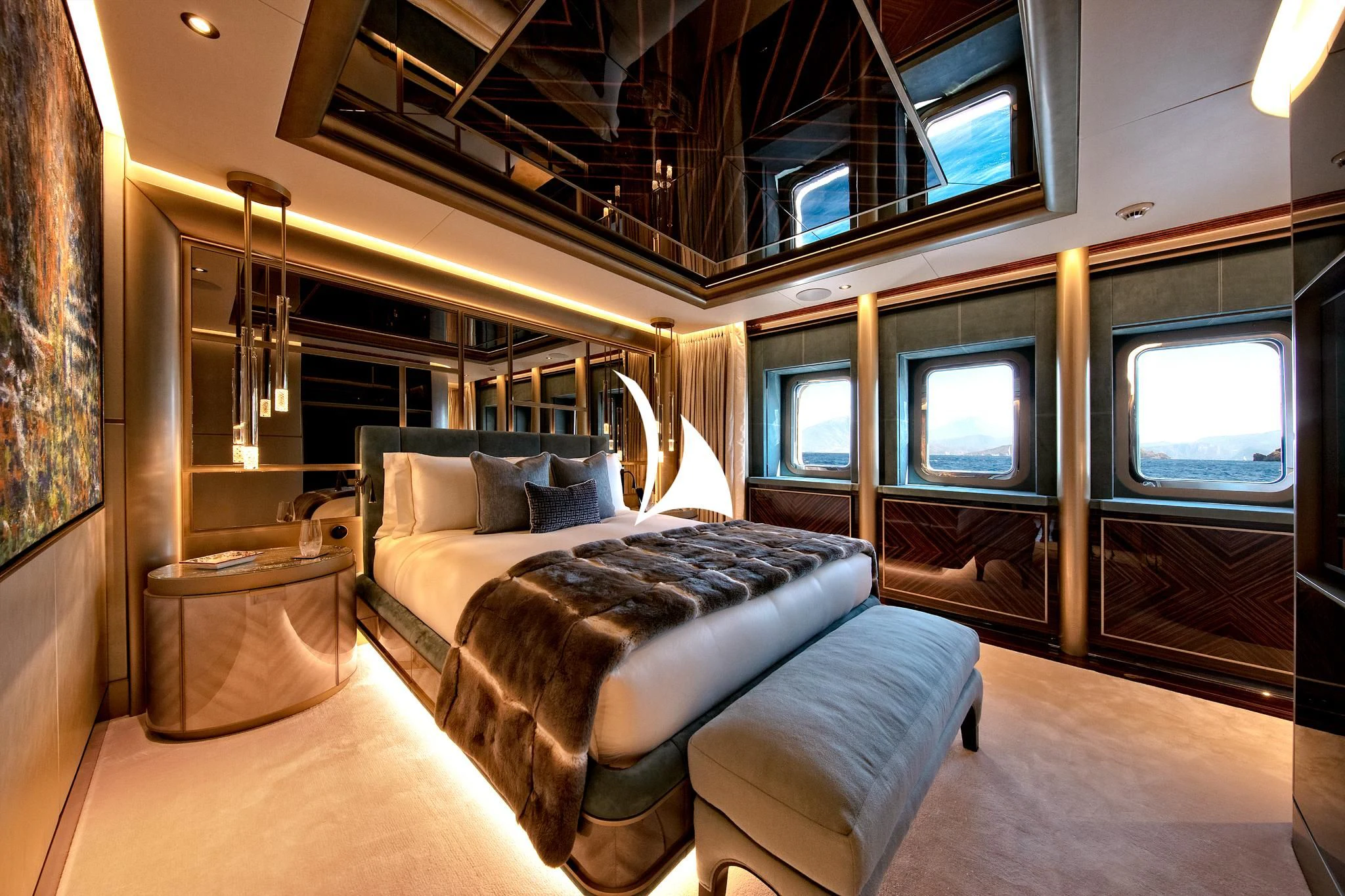 a bedroom with a bed and a large window aboard ARROW Yacht for Sale