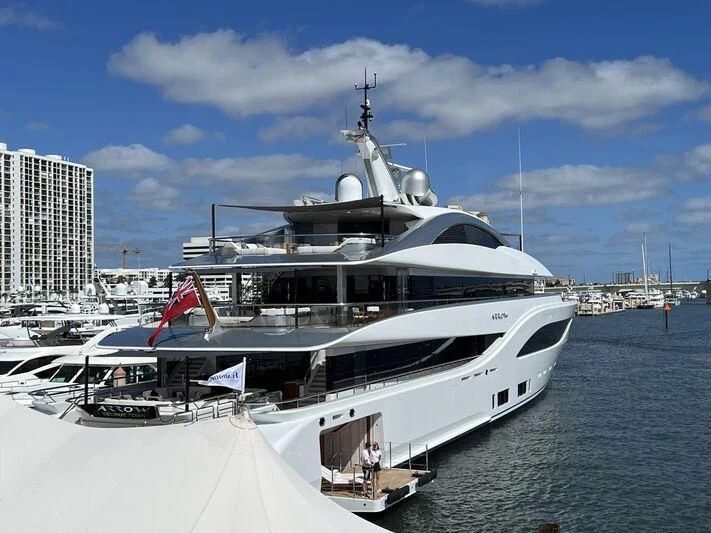 a large cruise ship docked aboard ARROW Yacht for Sale