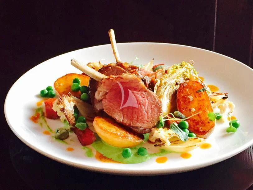 a plate of food aboard NELA Yacht for Charter