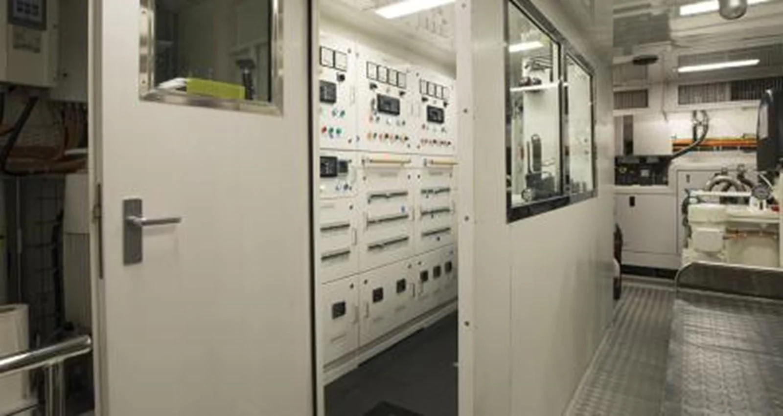a room with white cabinets aboard NELA Yacht for Charter