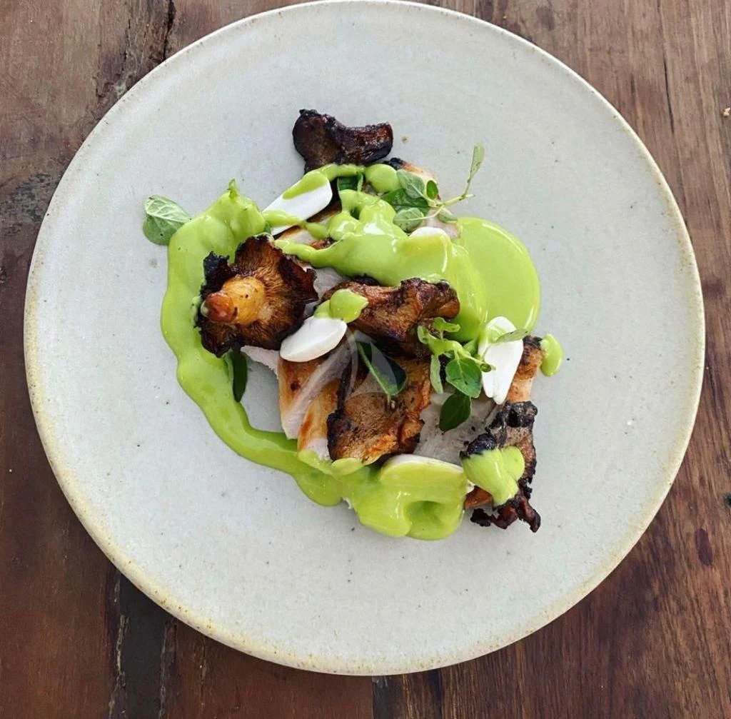 a plate of food aboard NELA Yacht for Charter