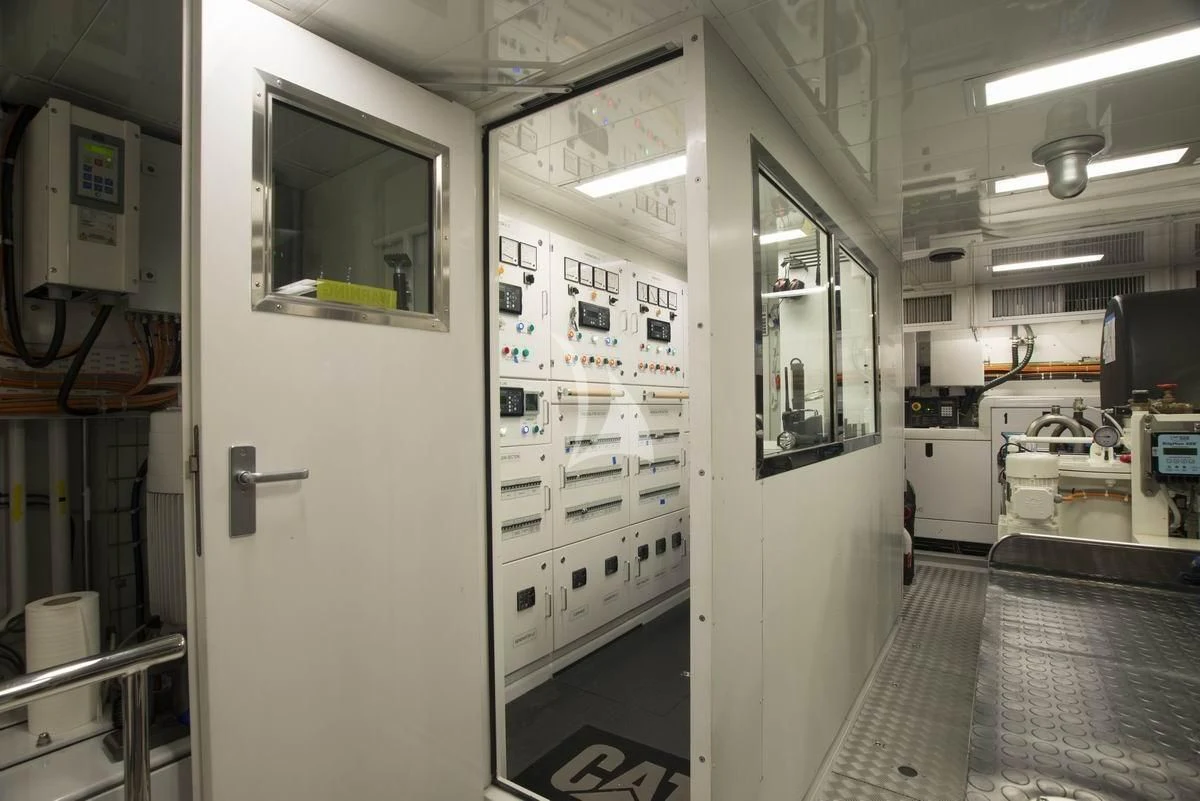 a room with a large glass door aboard NELA Yacht for Charter