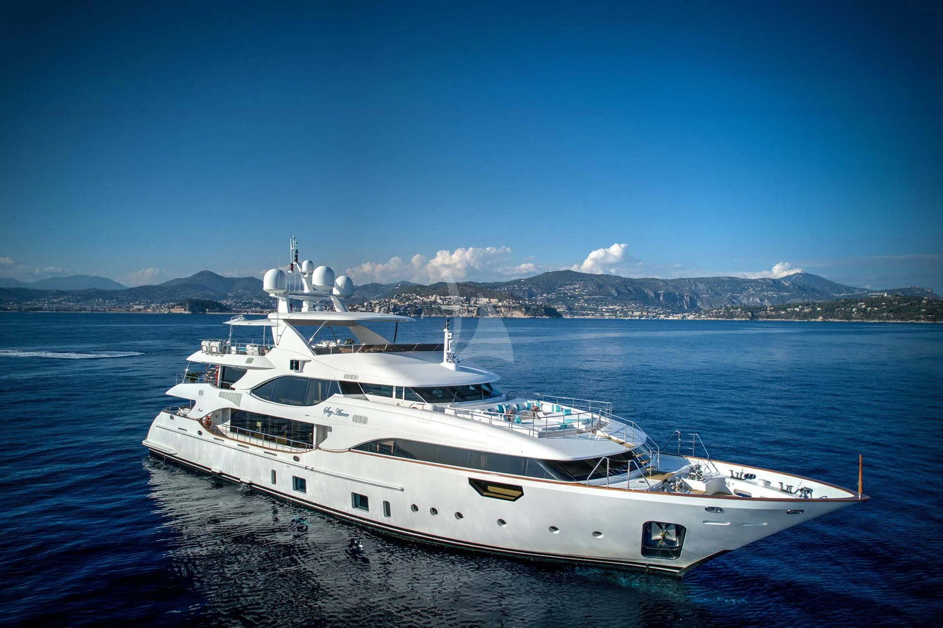 a white yacht on the water aboard NELA Yacht for Charter