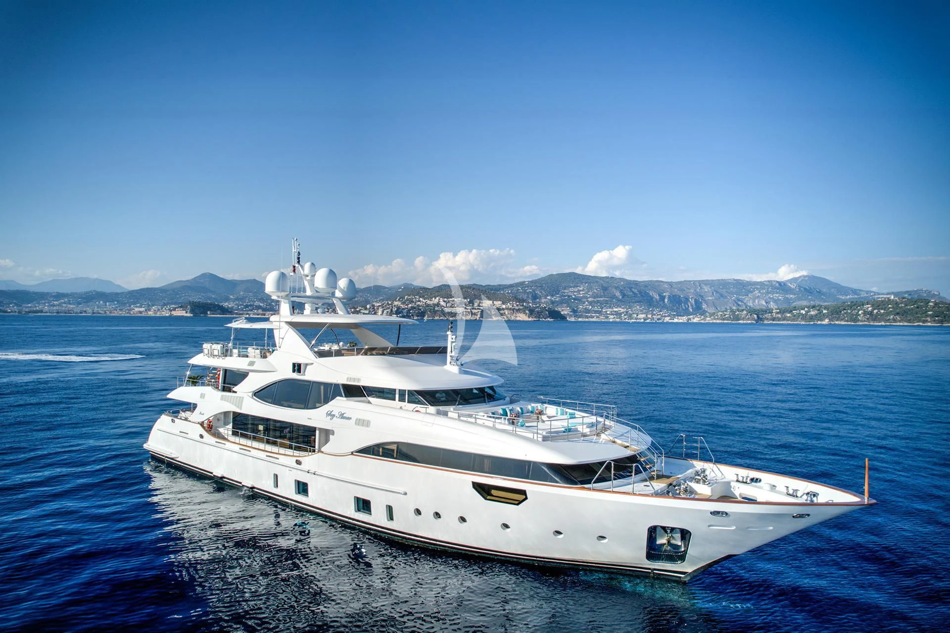 a white yacht in the water aboard NELA Yacht for Charter