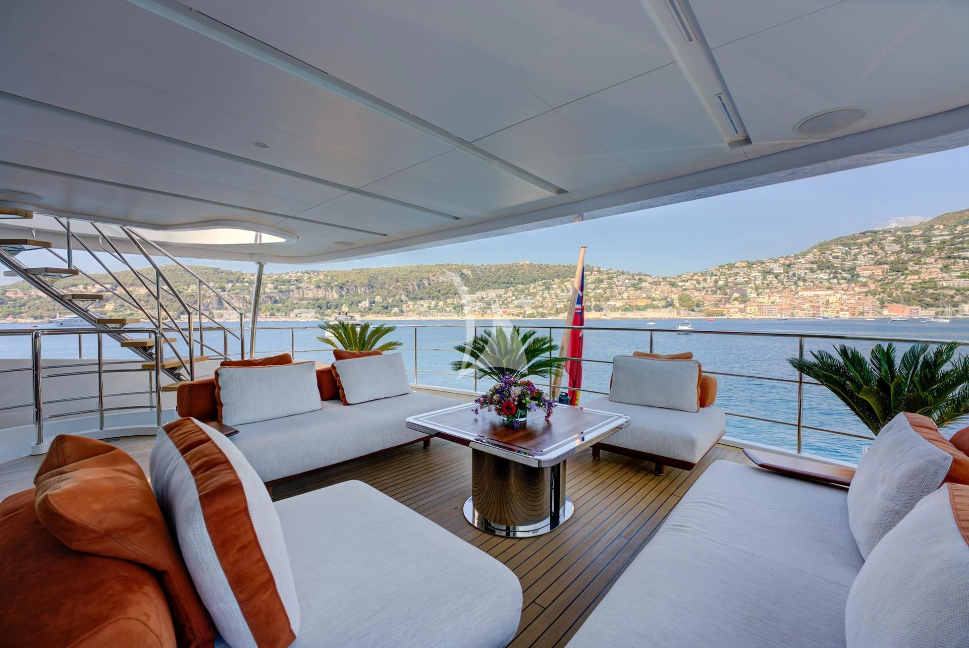 a living room with a large window aboard NELA Yacht for Charter
