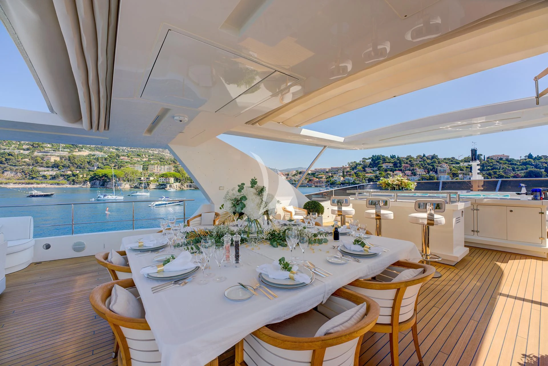 a large kitchen with a large island aboard NELA Yacht for Charter