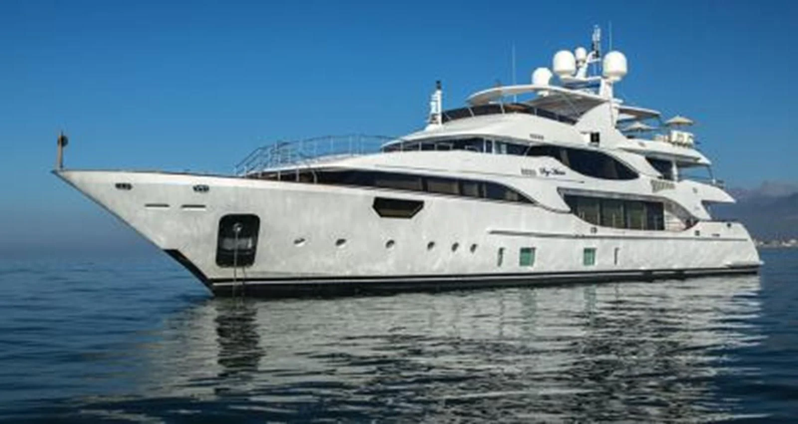 a large white ship aboard NELA Yacht for Charter