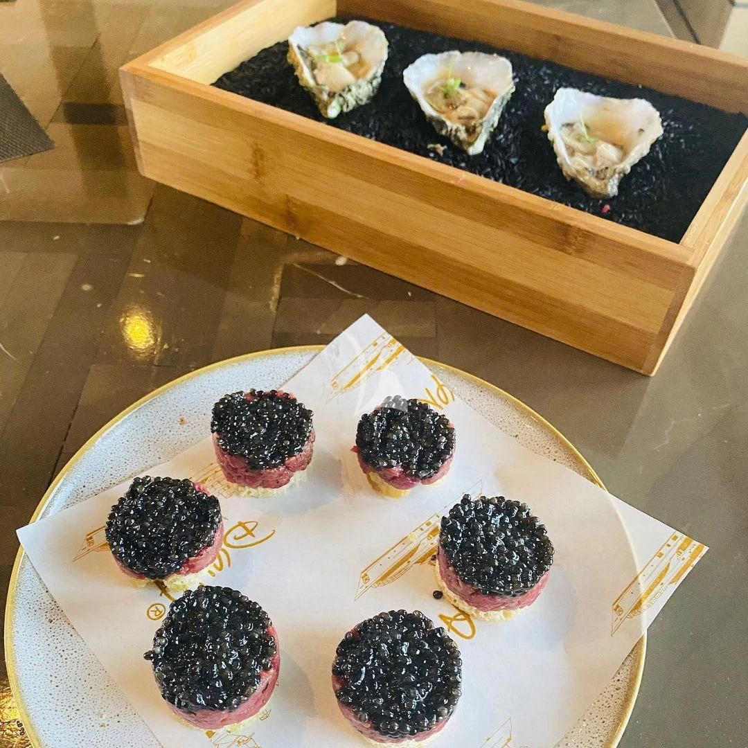 a table with food on it aboard NELA Yacht for Charter