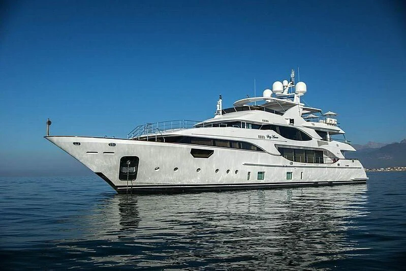 a large white ship in the water aboard NELA Yacht for Charter