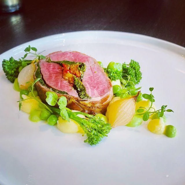 a plate of food aboard NELA Yacht for Charter