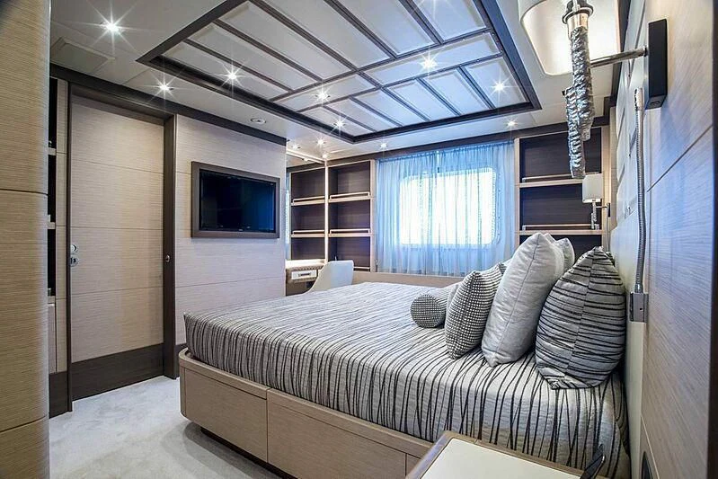 a bed in a room aboard NELA Yacht for Charter