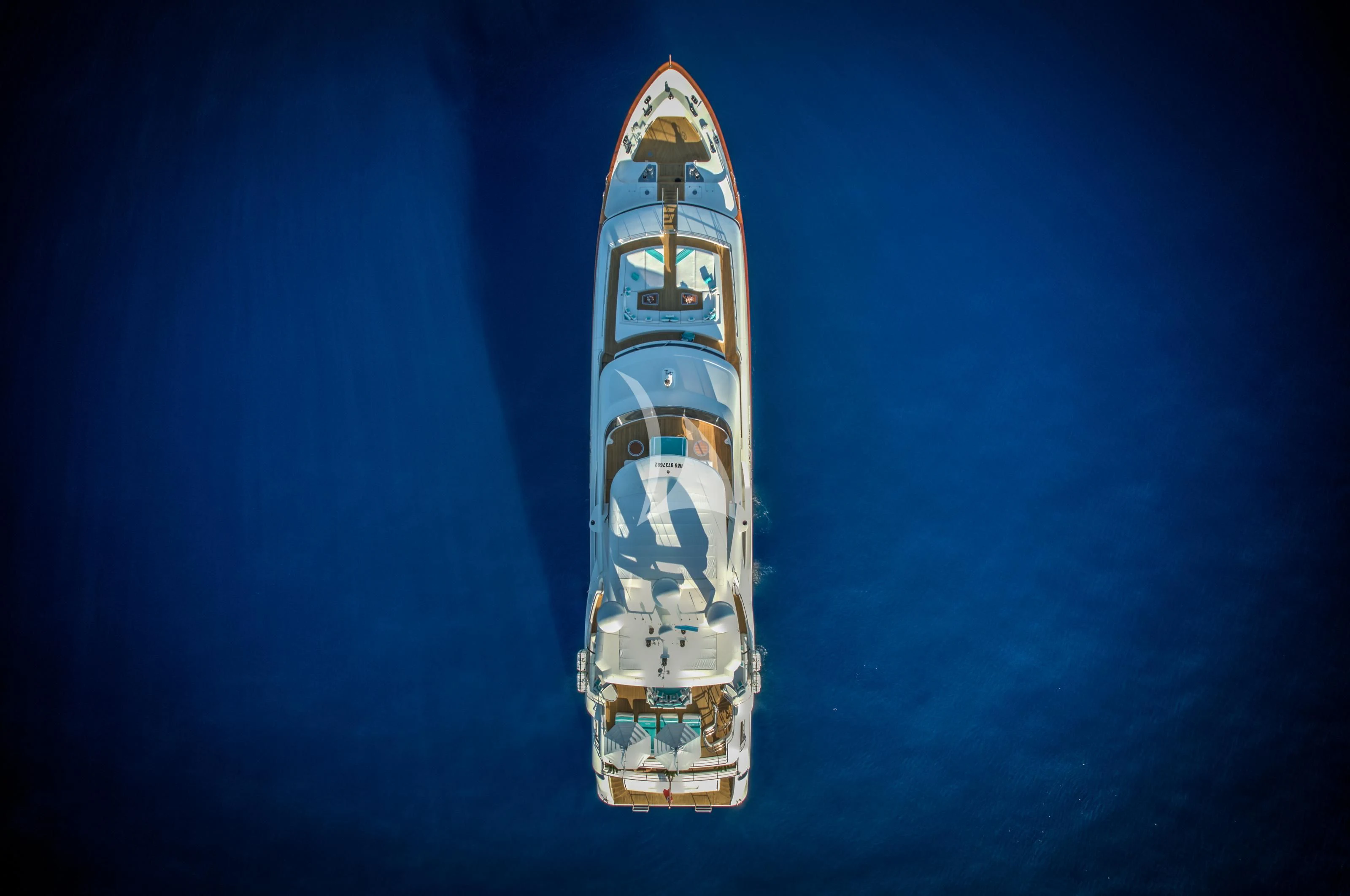 a tall tower with a flag on it aboard NELA Yacht for Charter