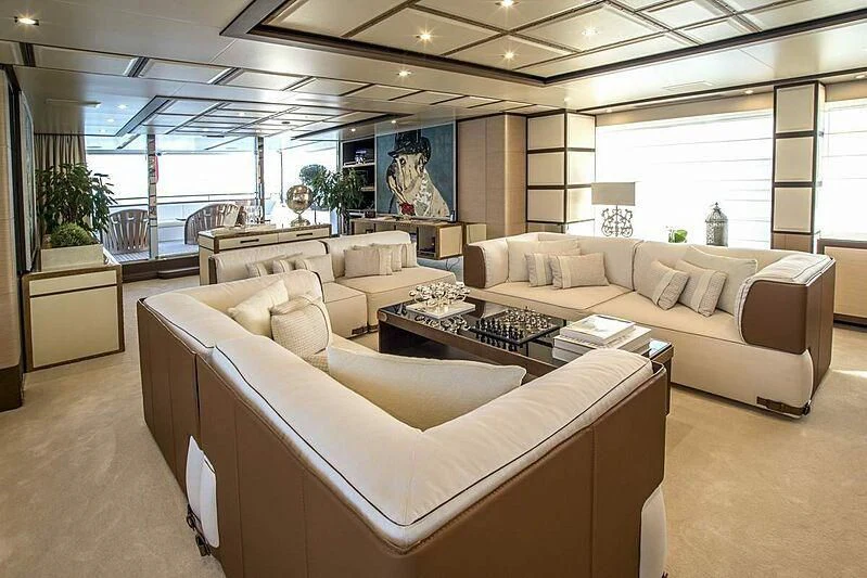 a living room with a large window aboard NELA Yacht for Charter