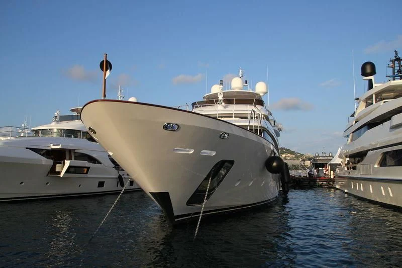 a group of boats in the water aboard NELA Yacht for Charter