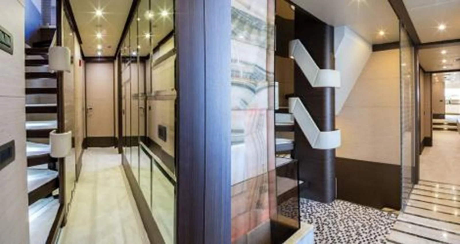 a hallway with a glass door aboard NELA Yacht for Charter