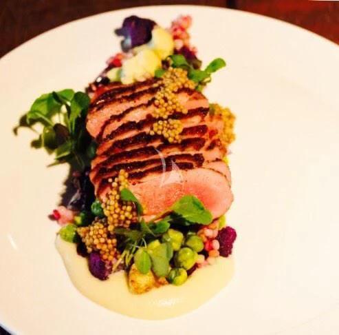 a plate of food aboard NELA Yacht for Charter