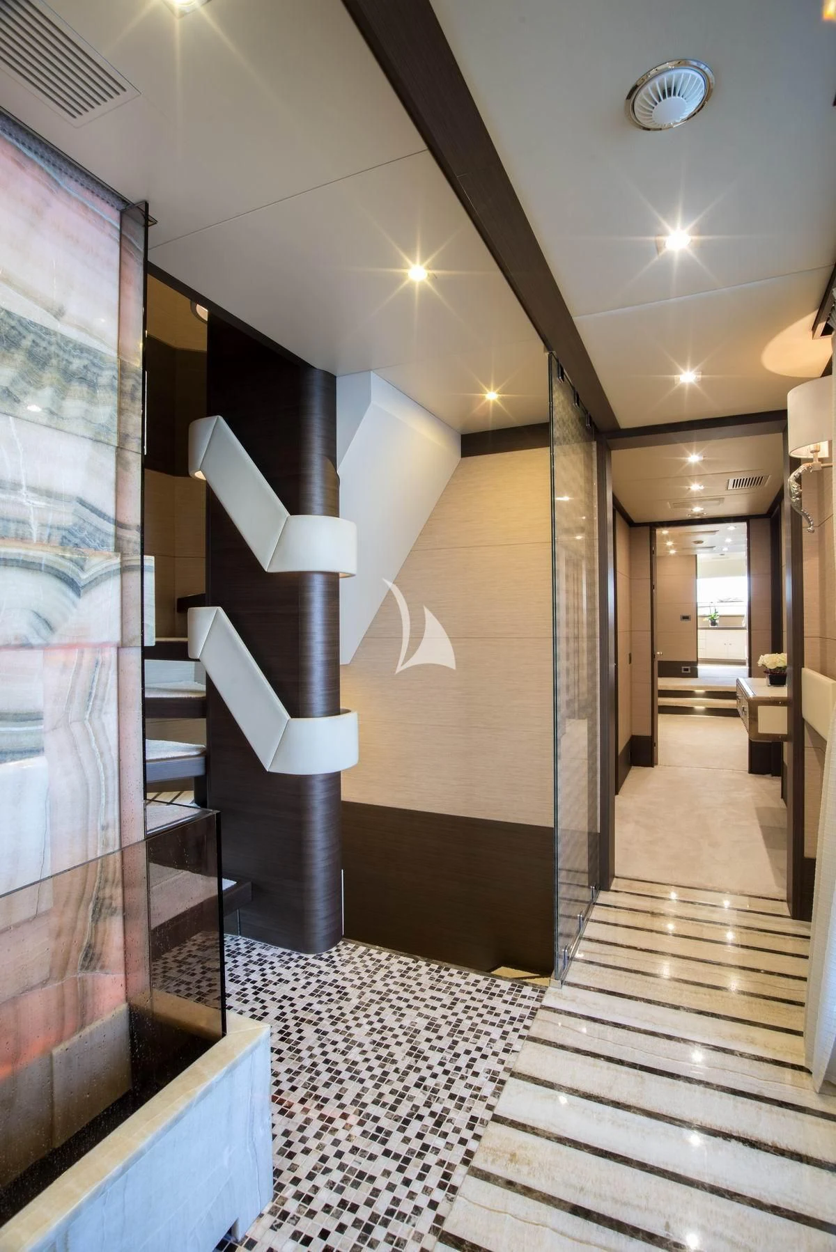 a hallway with glass doors aboard NELA Yacht for Charter