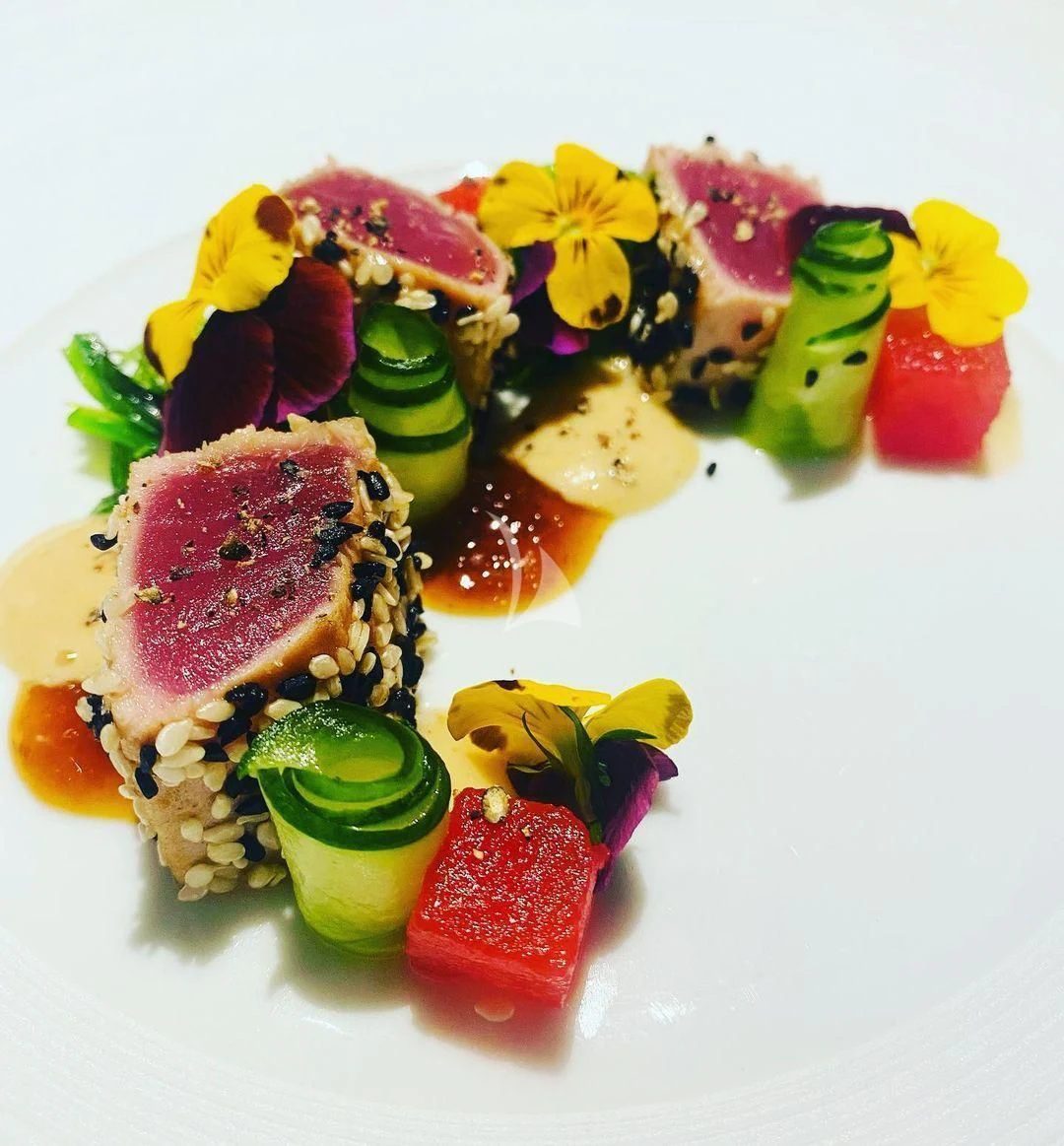 a plate of colorful sushi aboard NELA Yacht for Charter