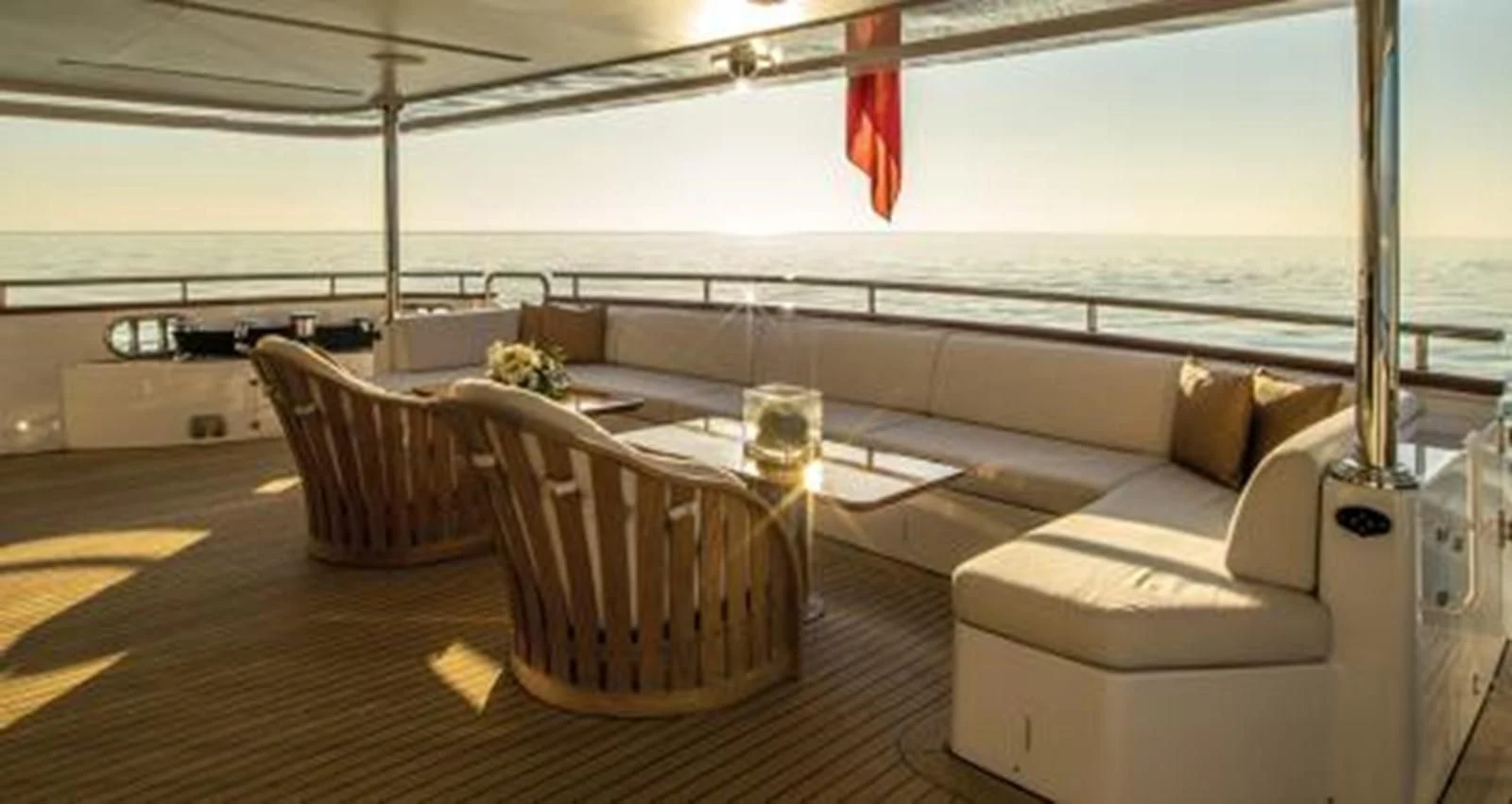 a room with a couch and chairs aboard NELA Yacht for Charter