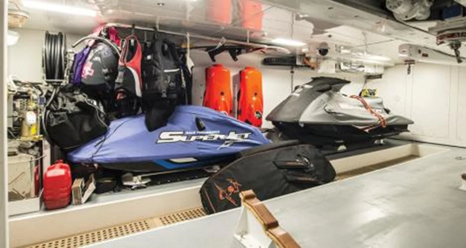 a group of luggage on a conveyor belt aboard NELA Yacht for Charter