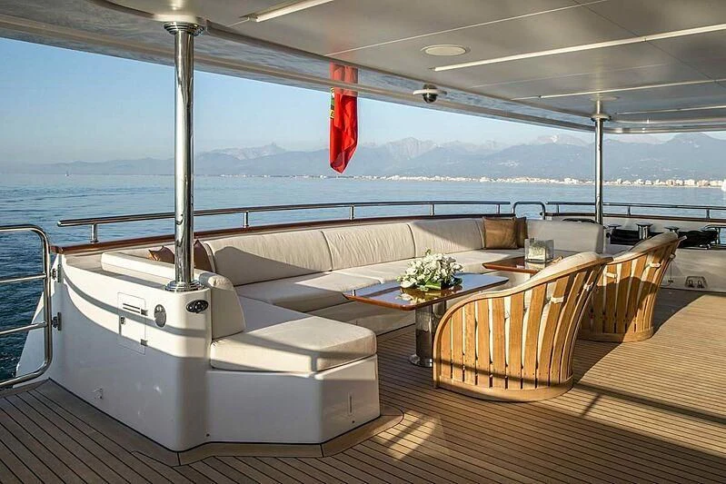 a large white sofa on a boat aboard NELA Yacht for Charter