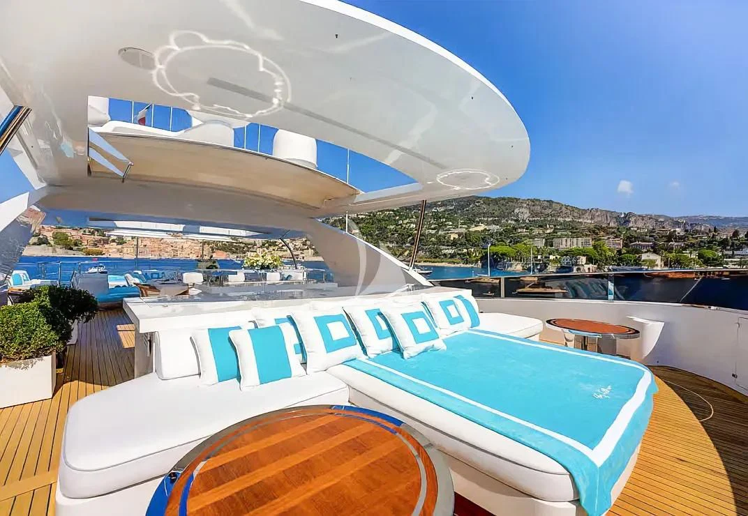 a large building with a pool aboard NELA Yacht for Charter