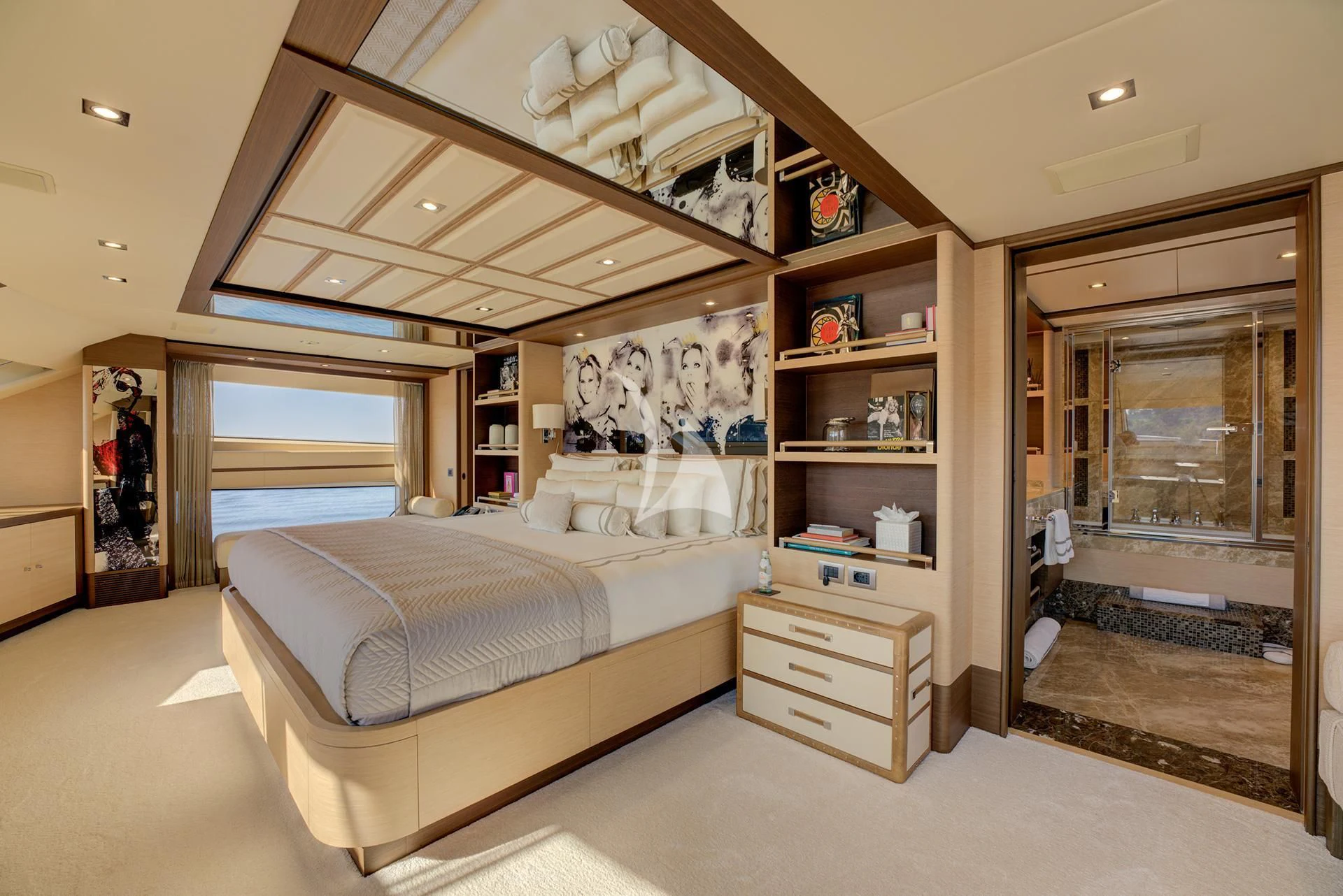 a bedroom with a bed and a closet aboard NELA Yacht for Charter