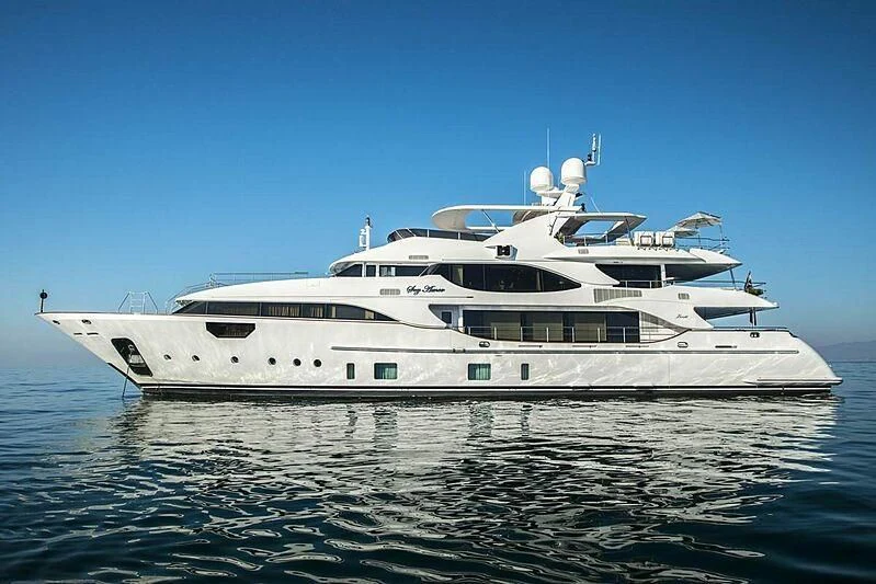 a white yacht on the water aboard NELA Yacht for Charter