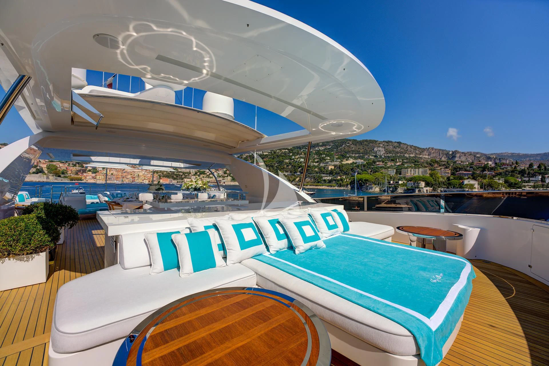 a large building with a pool aboard NELA Yacht for Charter